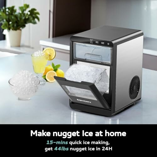 Countertop nugget ice maker with ice and lemon drink.